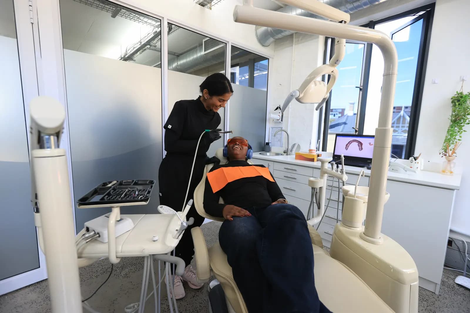 Dentist treating a patient in the Mia Cape Town surgery