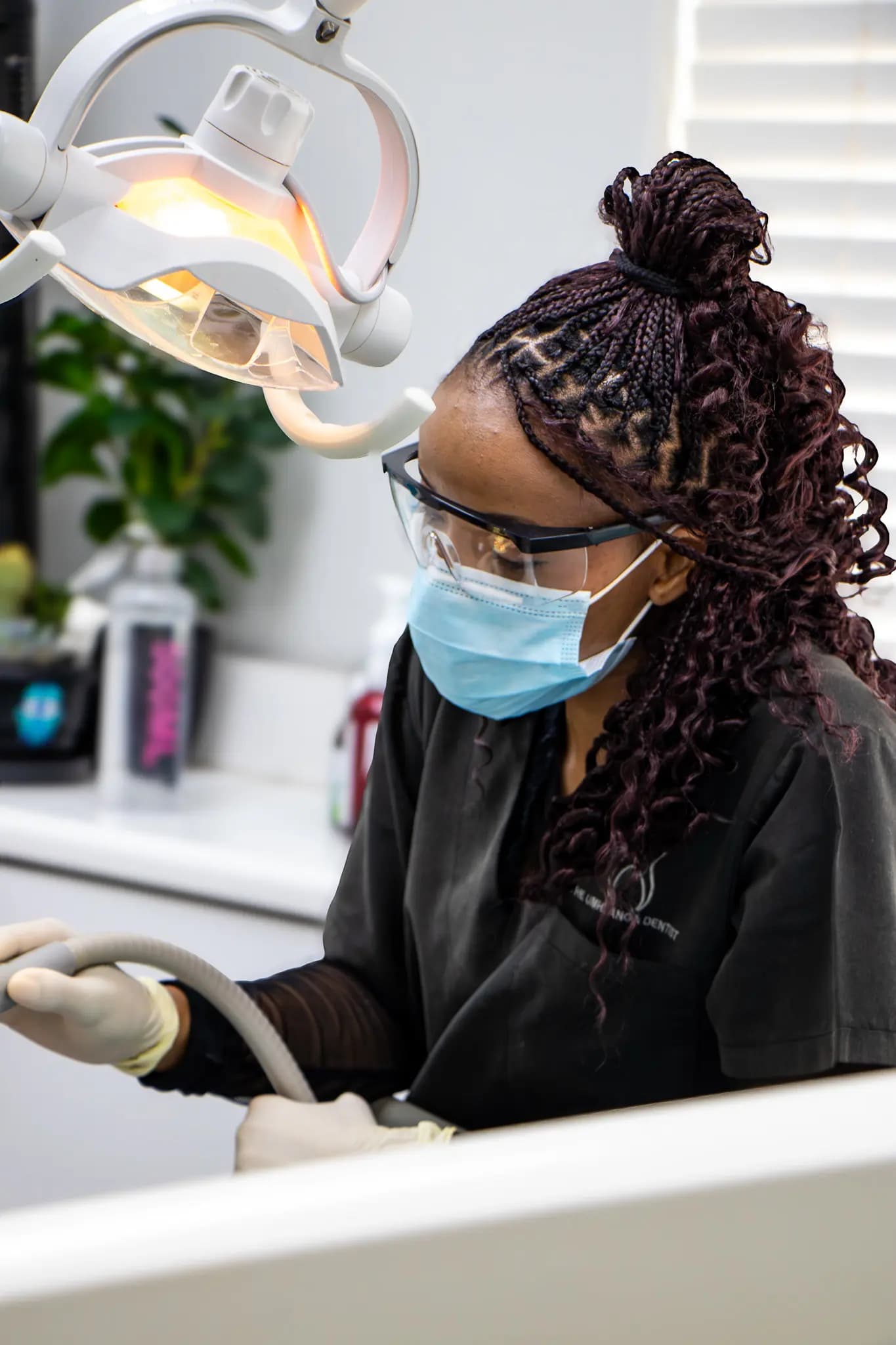 A Mia dentist treating a patient