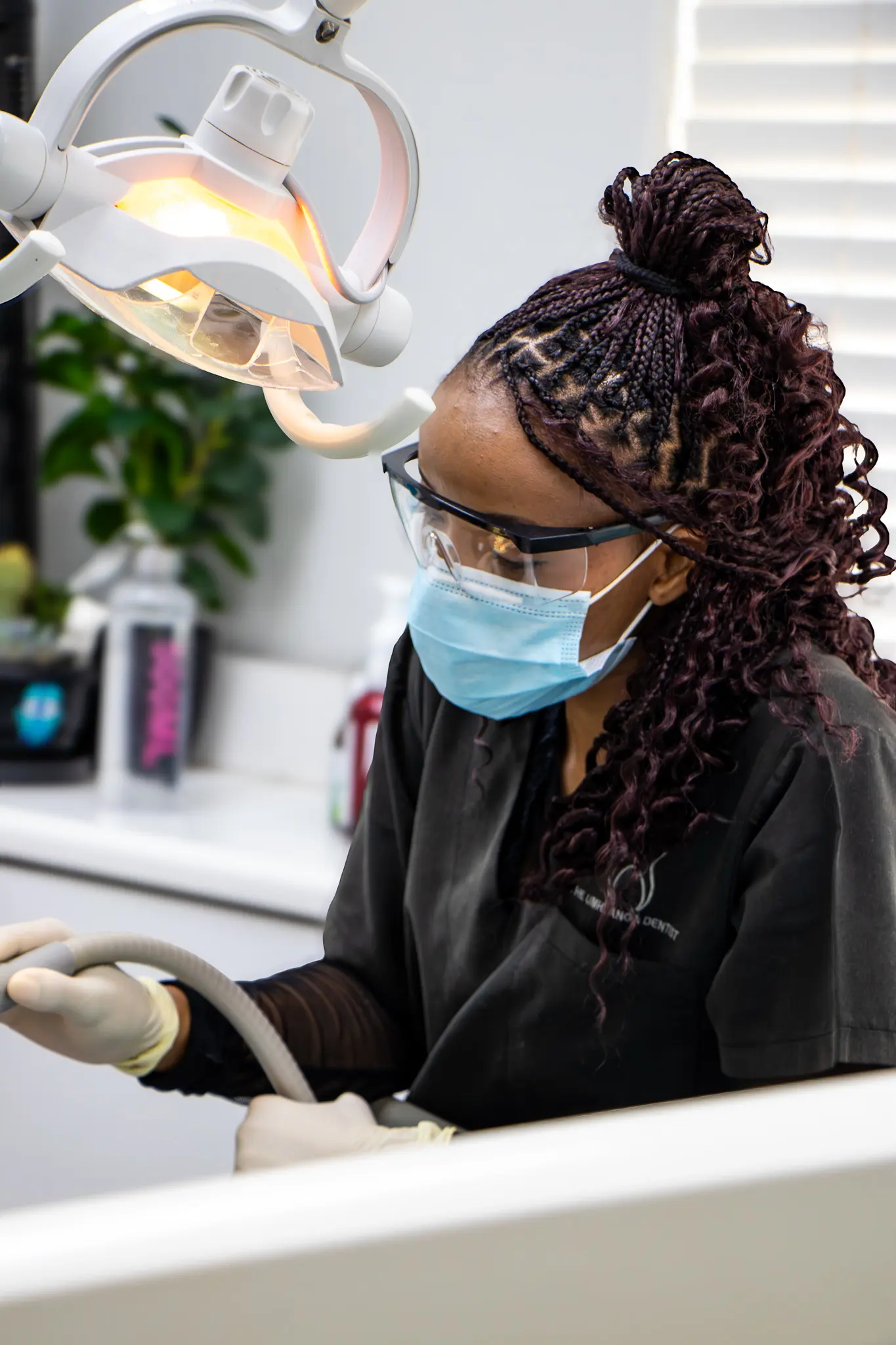 A Mia dentist treating a patient
