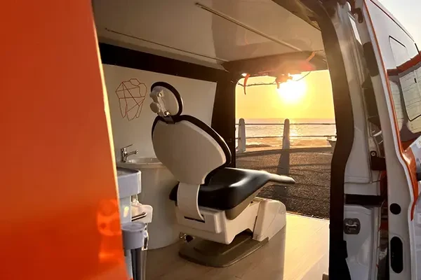 The dental chair inside the Mia mobile clinic at sunset